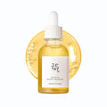 Beauty serum bottle with dropper on a white background