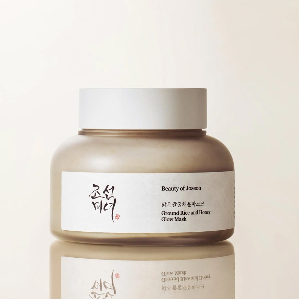 Beauty of Joseon Ground Rice and Honey Glow Mask jar on a beige background