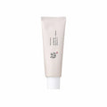 White tube of skincare product on a white background