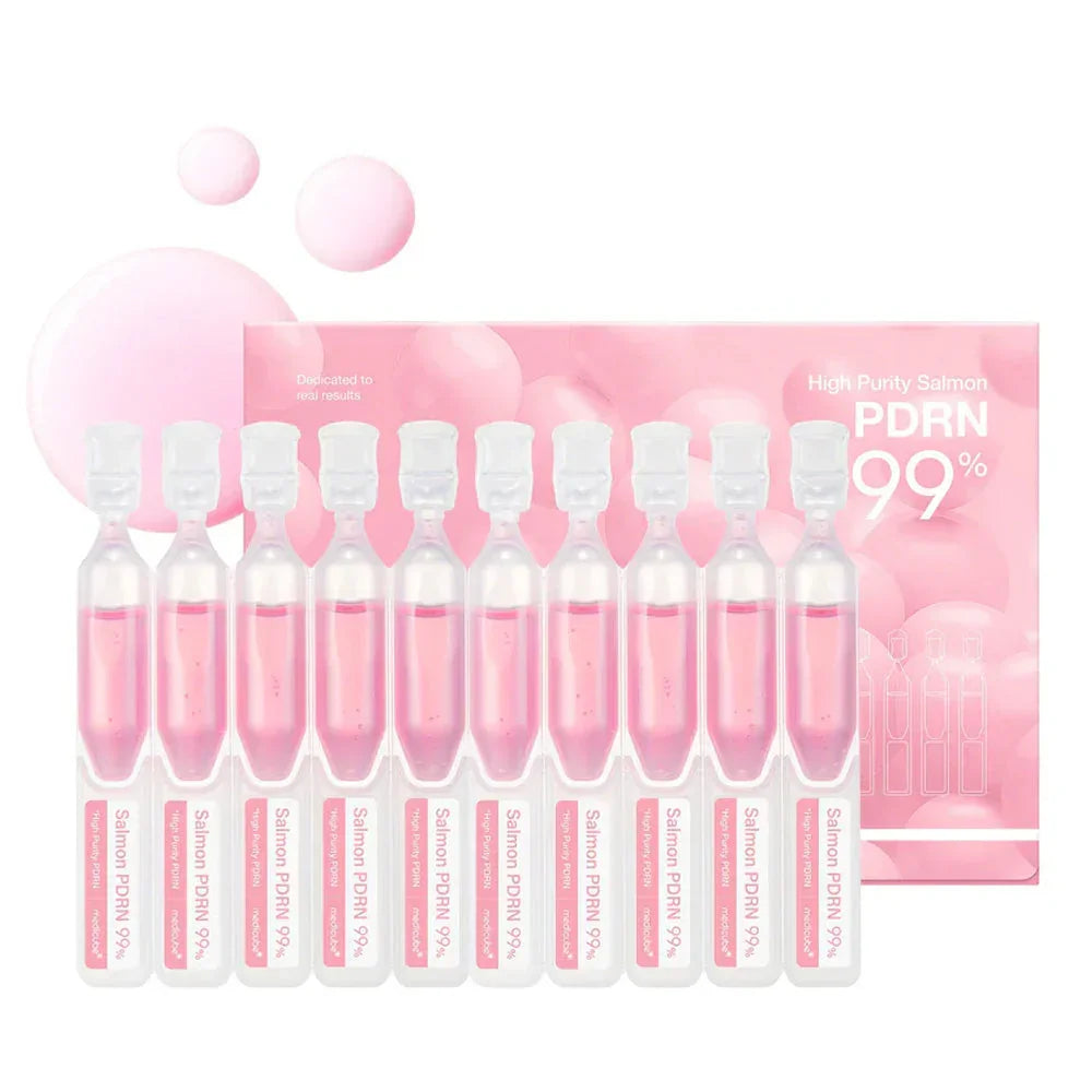 Salmon PDRN 99% ampoules for skin treatment, pink serum vials with matching pink box