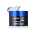 Medicube Zero Pore One Day Cream jar with blue lid and a scoop of cream, pore minimizing skincare