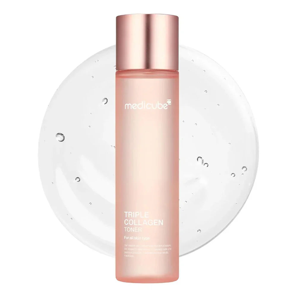 Pink bottle of Triple Collagen Toner for all skin types with liquid and bubbles behind
